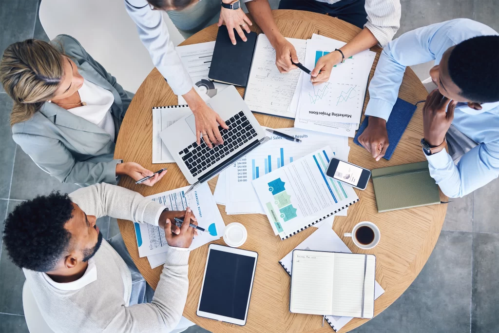 brand strategy meeting around a desk